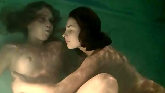 Lesbian foreplay with two babes underwater