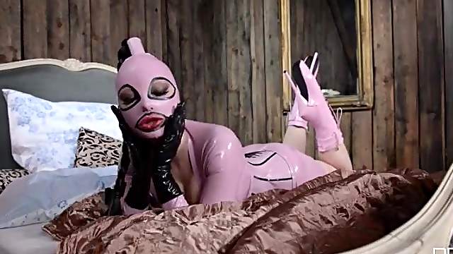 Kinky fetish model Latex Lucy in pink