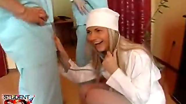 Hot nurse in white stockings at a party
