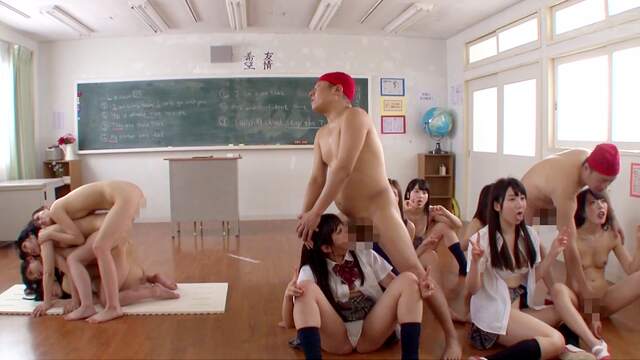 Japanese teachers freeze time to create naked tower of butts