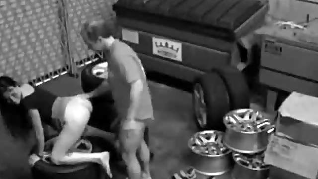 Mechanic nails hot girl from behind over tires
