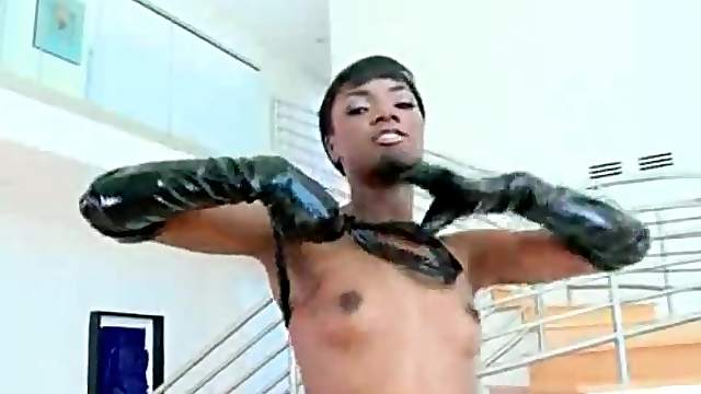 Black girl wears sexy black gloves and poses for pics